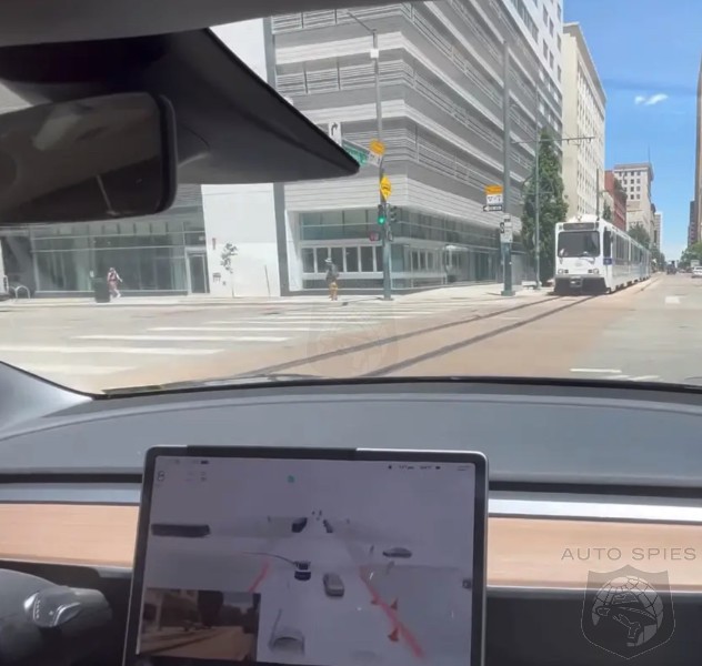 WATCH: Self Driving Tesla Almost Runs Into Oncoming Train